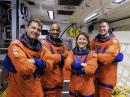 PHOTO: Artemis II NASA astronauts (left to right) Reid Wiseman, KF5LKT; Victor Glover, KI5BKC; and Christina Koch, along with Canadian Space Agency (CSA) astronaut Jeremy Hansen, KF5LKU. [NASA Photo by Frank Michaux]